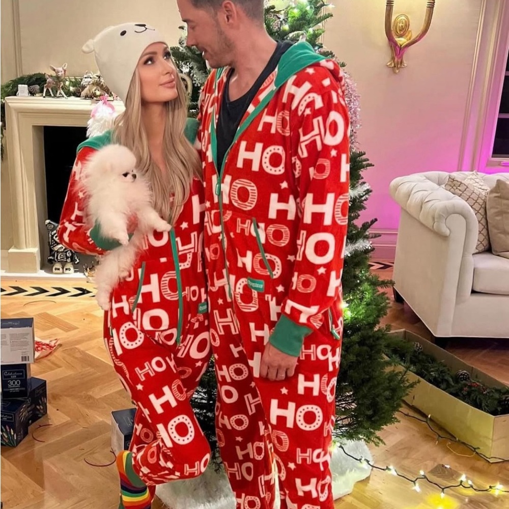 Selling two Tipsy Elves Adult Onsies one size Medium one is a size Large.